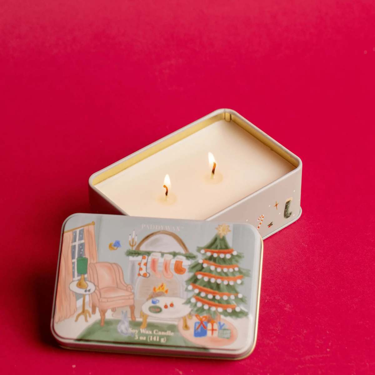Persimmon & Chestnut Holiday Tin Candle lit with lid